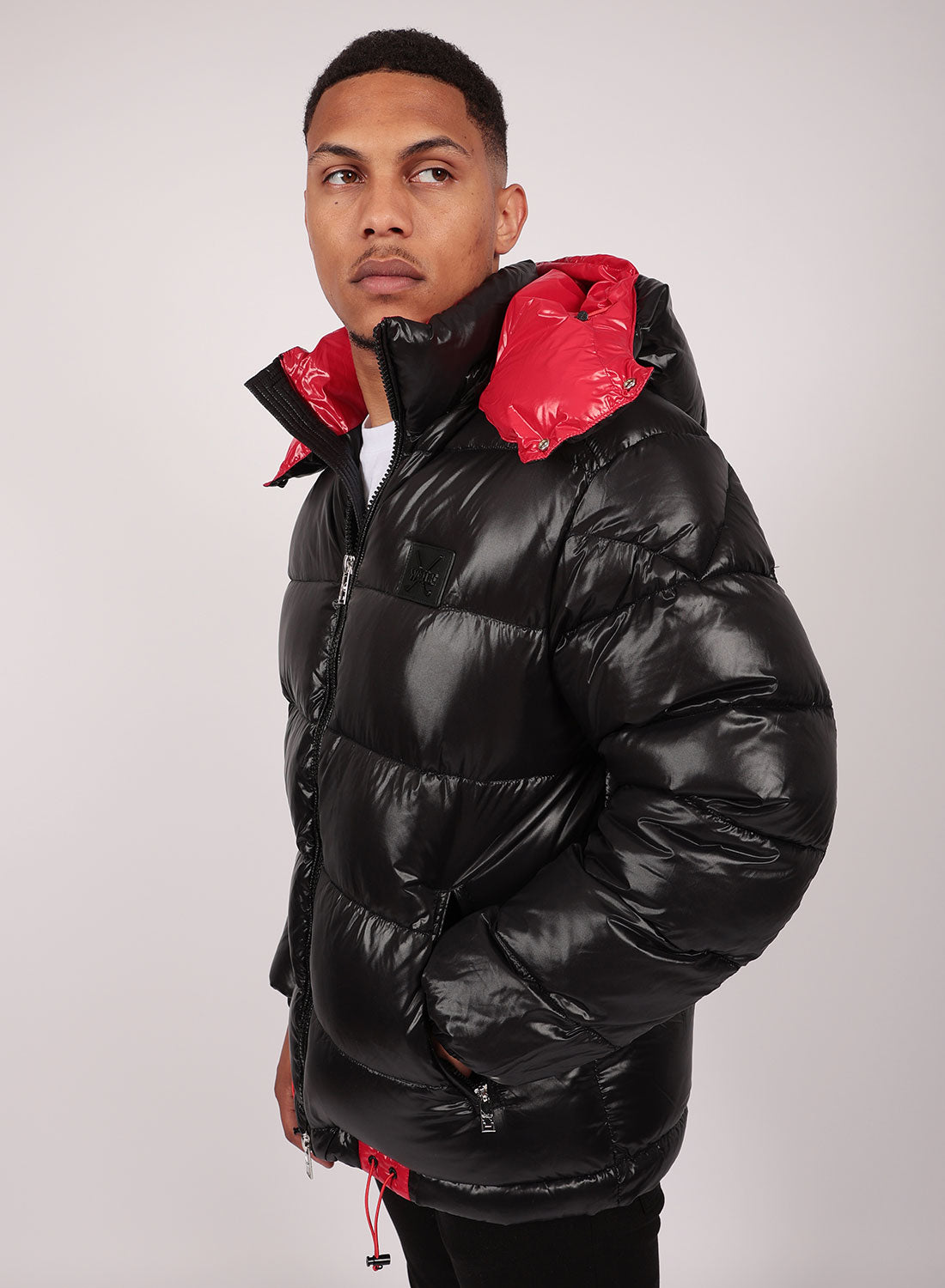 Black puffer jacket with red inside on sale